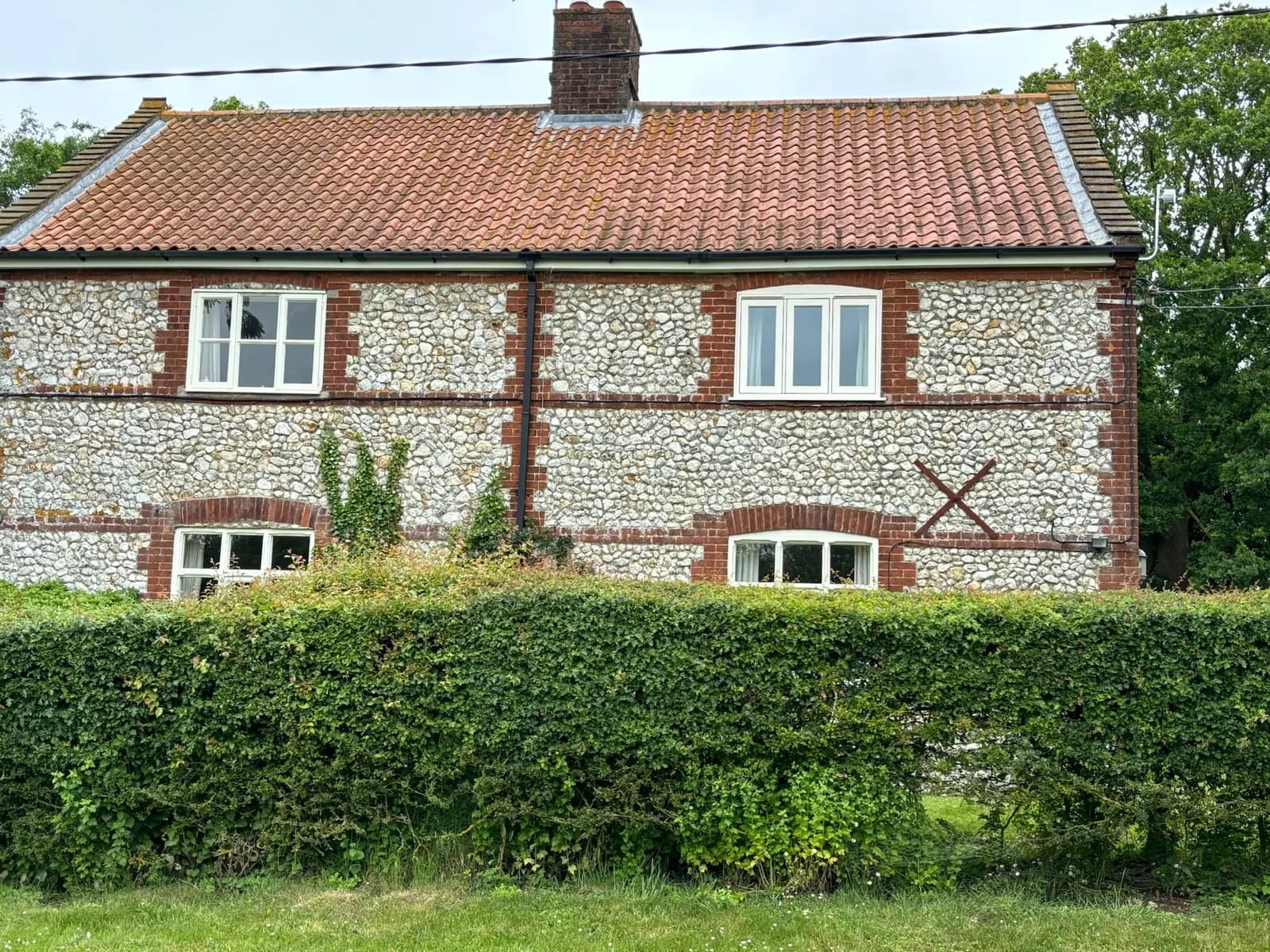 Cottage-style window viewed from the garden