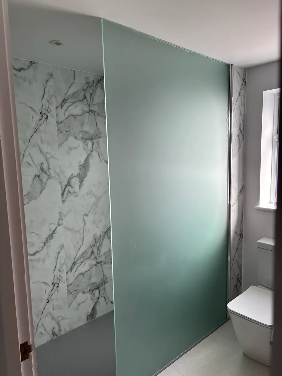 Full-height frosted glass shower screen